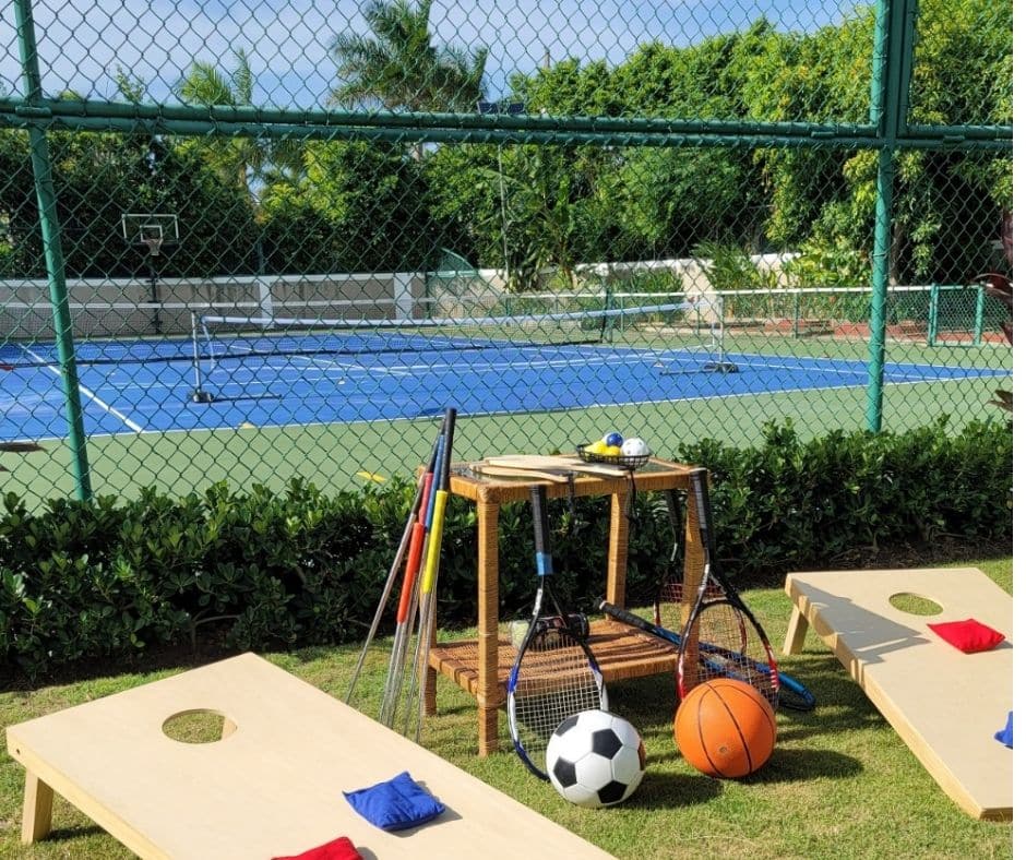 multipurpose court for pickleball, tennis, and basketball at Mais Oui Villa in Discovery Bay Jamaica