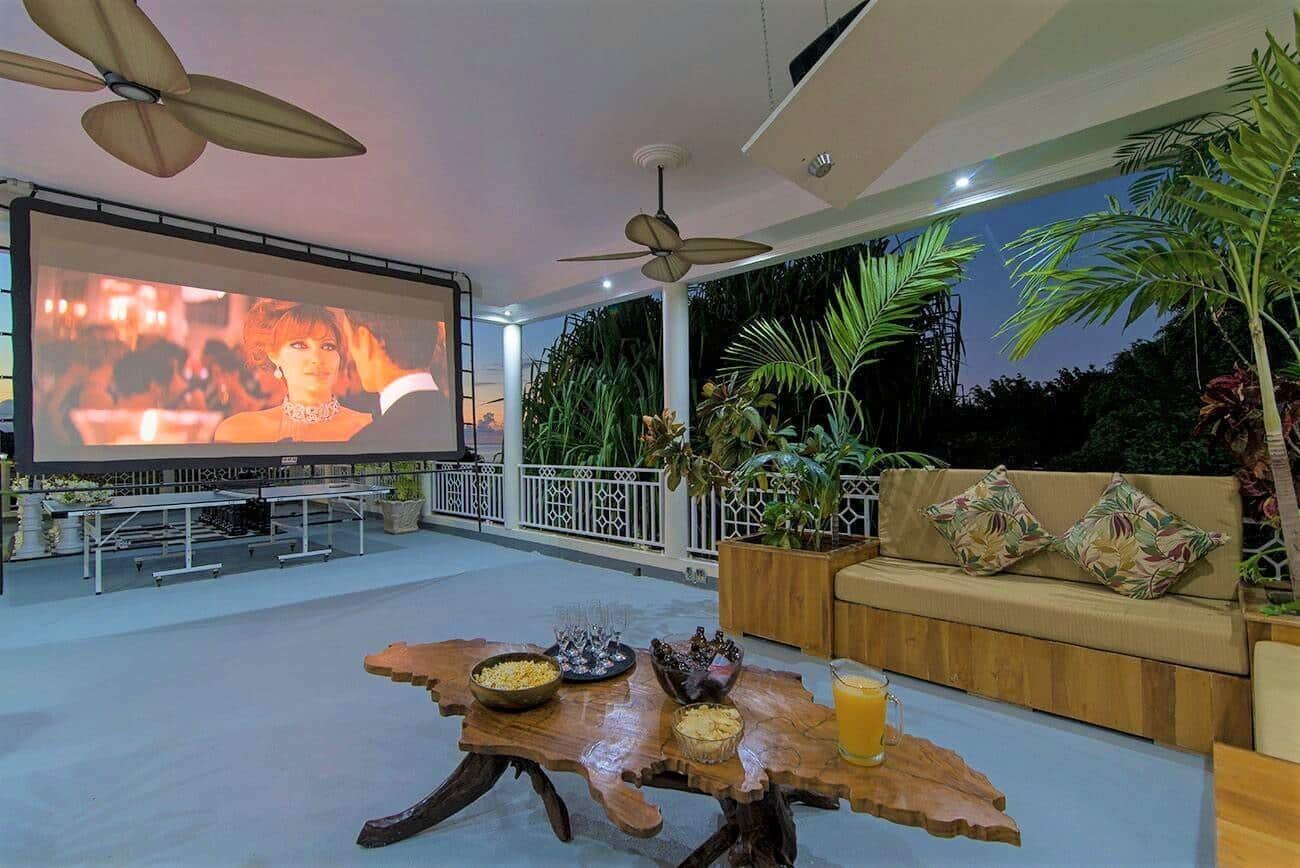 Movie night on our roof top terrace at a private Jamaican villa for rent - Mais Oui