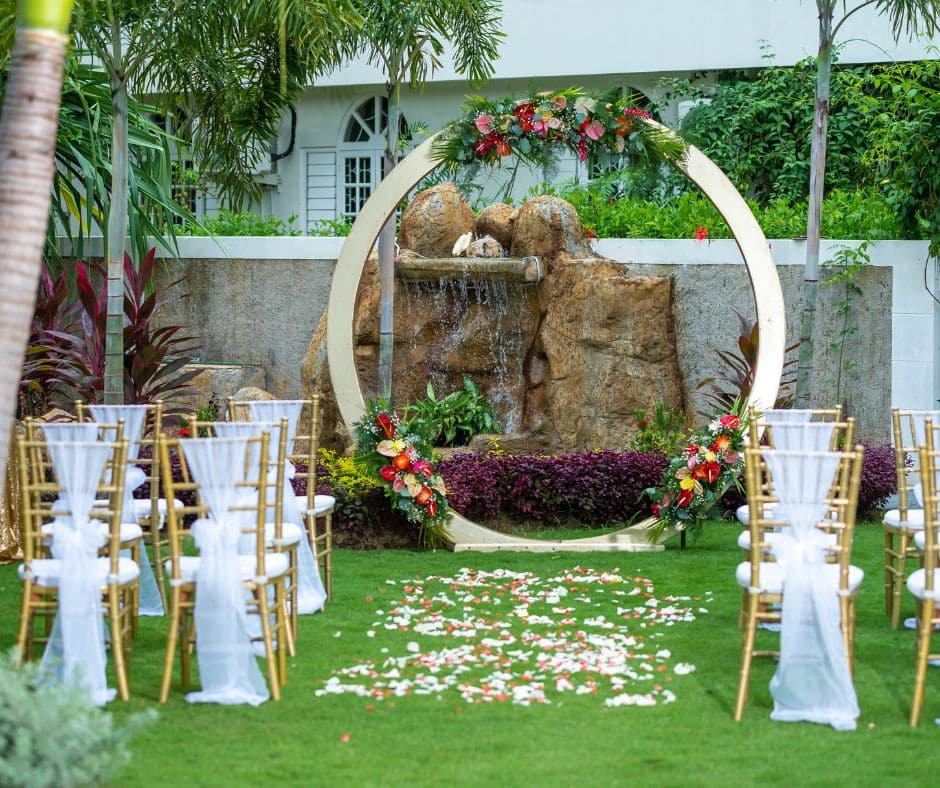 set up for an outdoor wedding reception st a Jamaica Villa that allows weddings