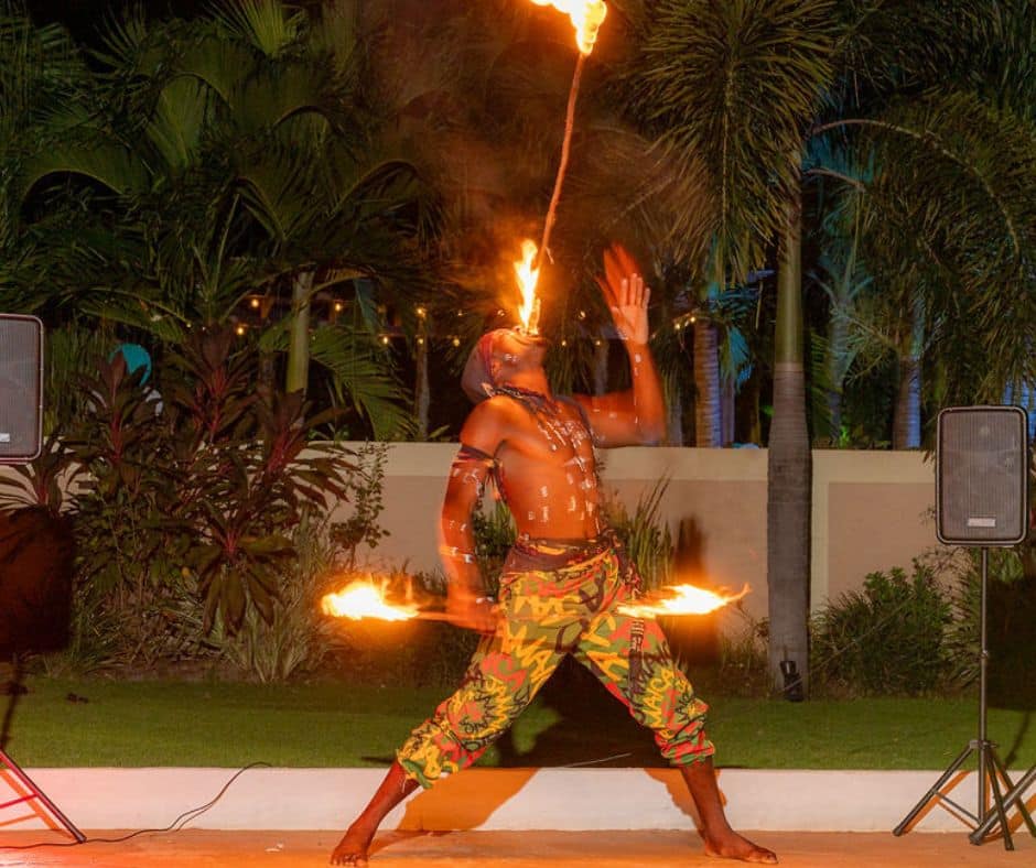 Fire dancer at tropical wedding in Jamaica at Mais Oui Villa