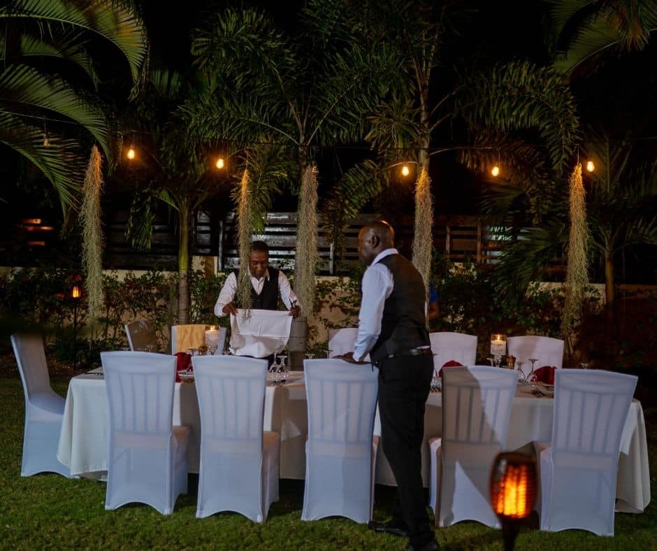 Setting for dinner on the front lawn at Mais Oui Villa in Discovery Bay Jamaica