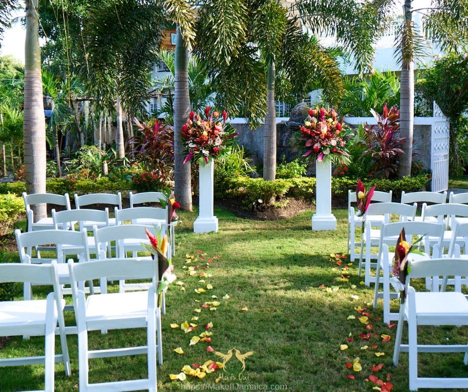 set up for a garden wedding at Mais Oui Villa in DiscoveryBay a wedding venue in Jamaica