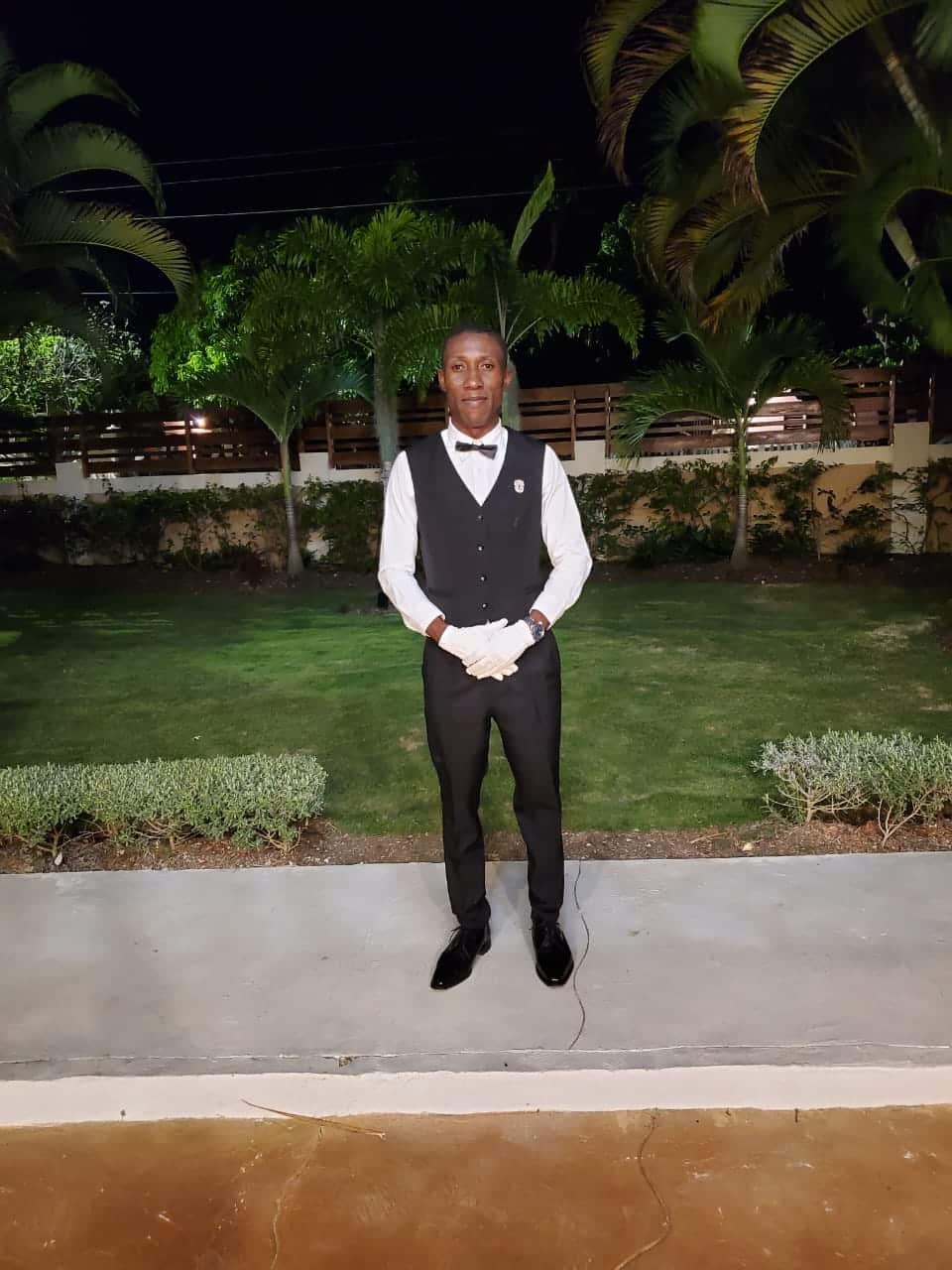 butler at Jamaica villa with staff - Mais Oui Villa in Discovery Bay Jamaica
