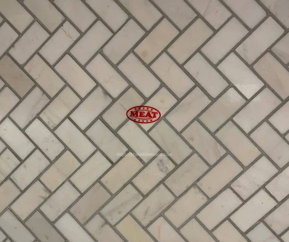 Sticker placed in kitchen by rabbi for kosher vacation in Jamaica