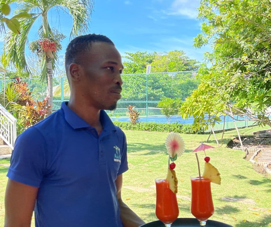 Being served drinks at your private villa with staff