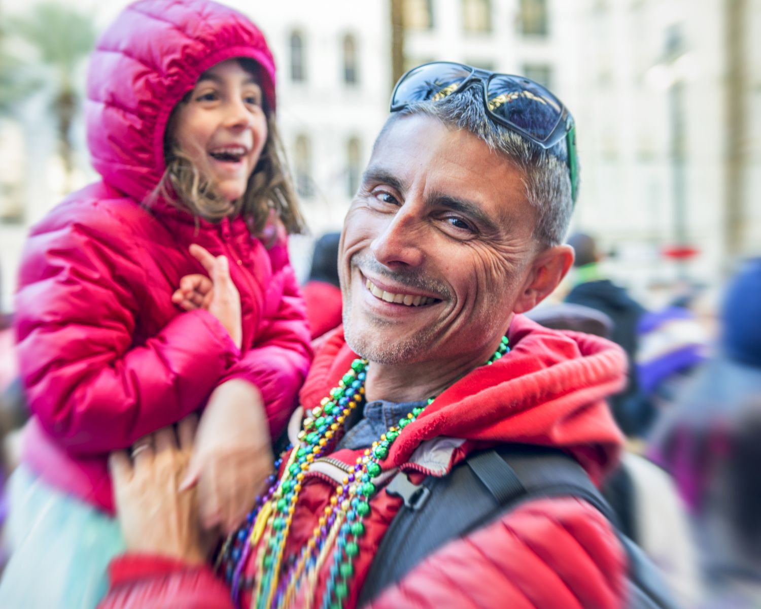 Family enjoying Mardi Gras in Galveston, TX