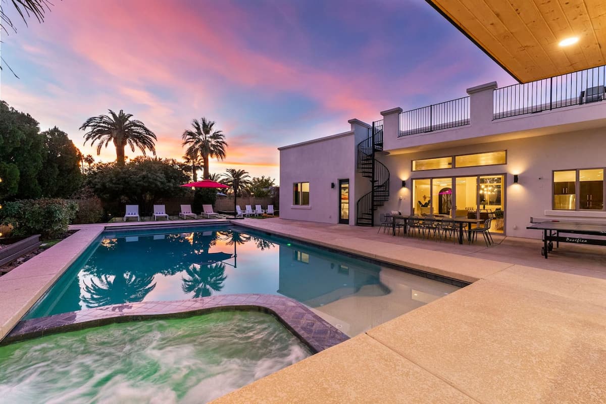 Paradise Villa pool, spa, rooftop patio, and modern exterior at sunset