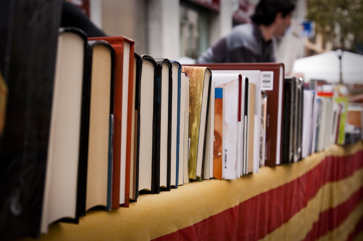 Books stacked at a festival in Charlottesville