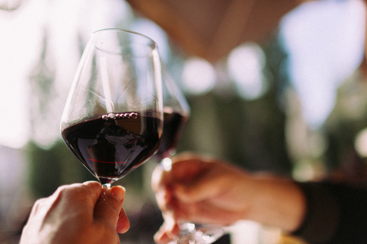 Two wine glasses cheers