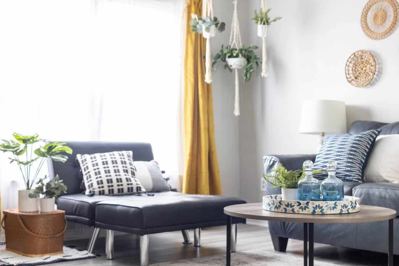 Serene and modern living room with minimalist décor, calming neutral tones, and natural light for a relaxing, zen-inspired atmosphere.