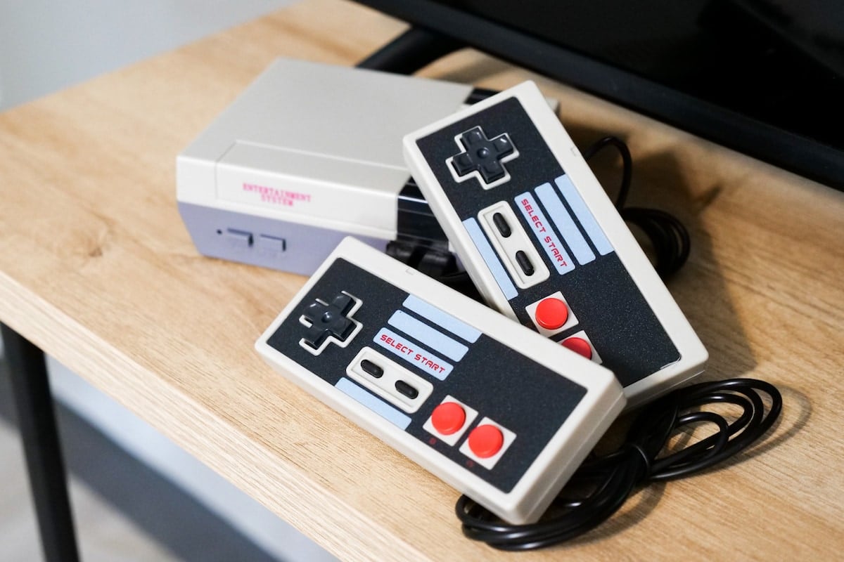 Classic Nintendo console and controllers in a short-term rental