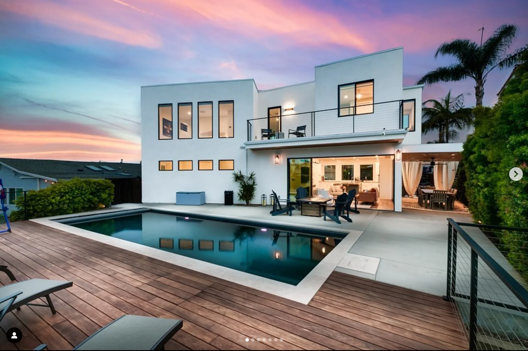 Modern white two-story San Diego rental property with pool and patio, managed with professional real estate accounting