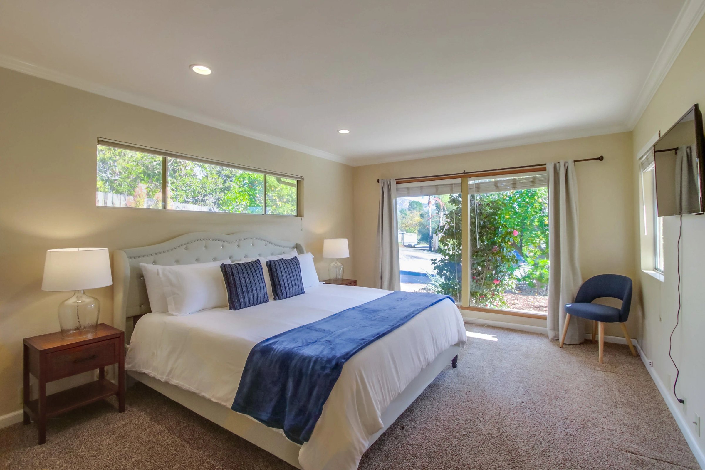 Master bedroom with king bed and natural light for San Diego STR turnover cleaning standards