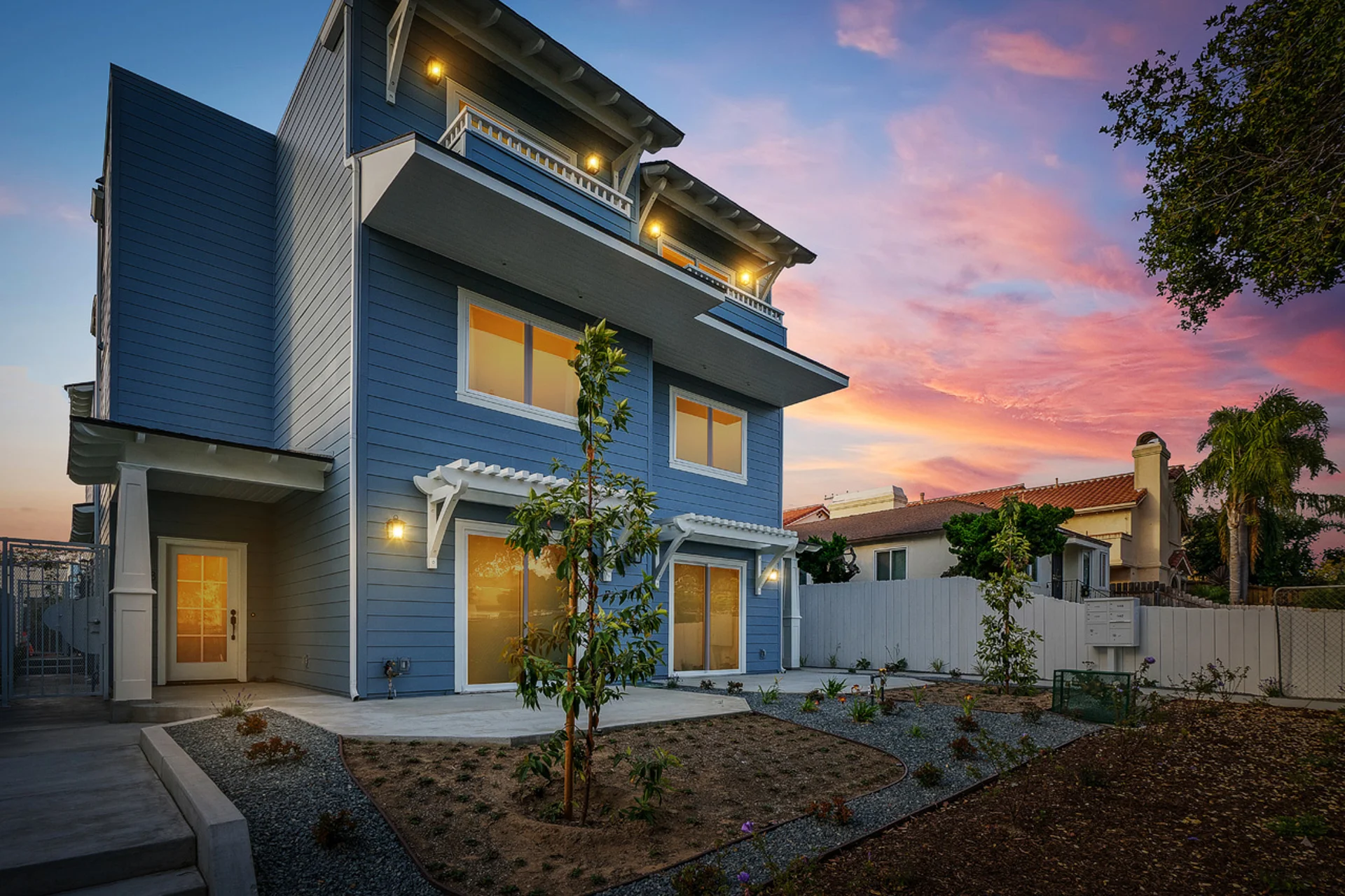 Modern blue contemporary home exterior with curb appeal ideal for hybrid STR and mid-term rental strategy in San Diego
