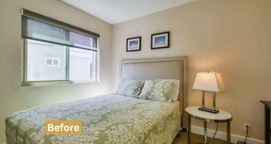 Well-lit guest bedroom with queen bed and natural light, showcasing property features important for San Diego vacation