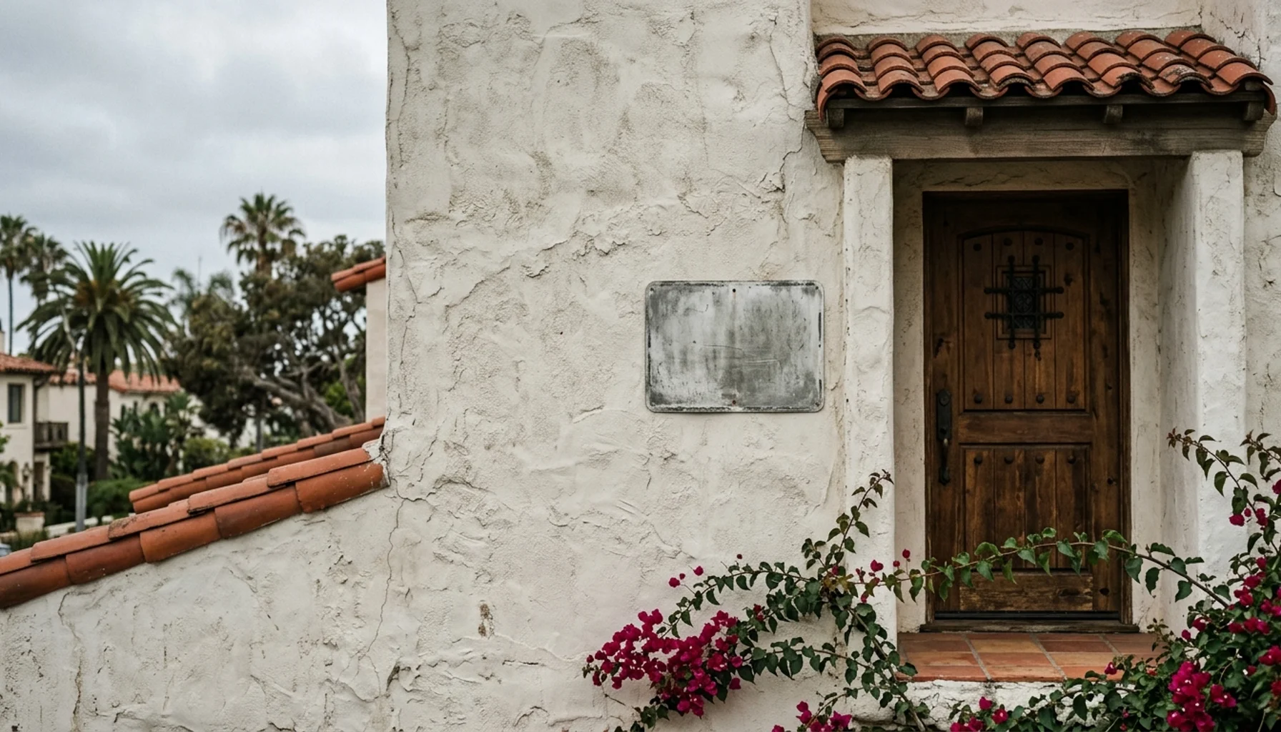 Permit placard on a stucco wall representing what to know before becoming a host in San Diego