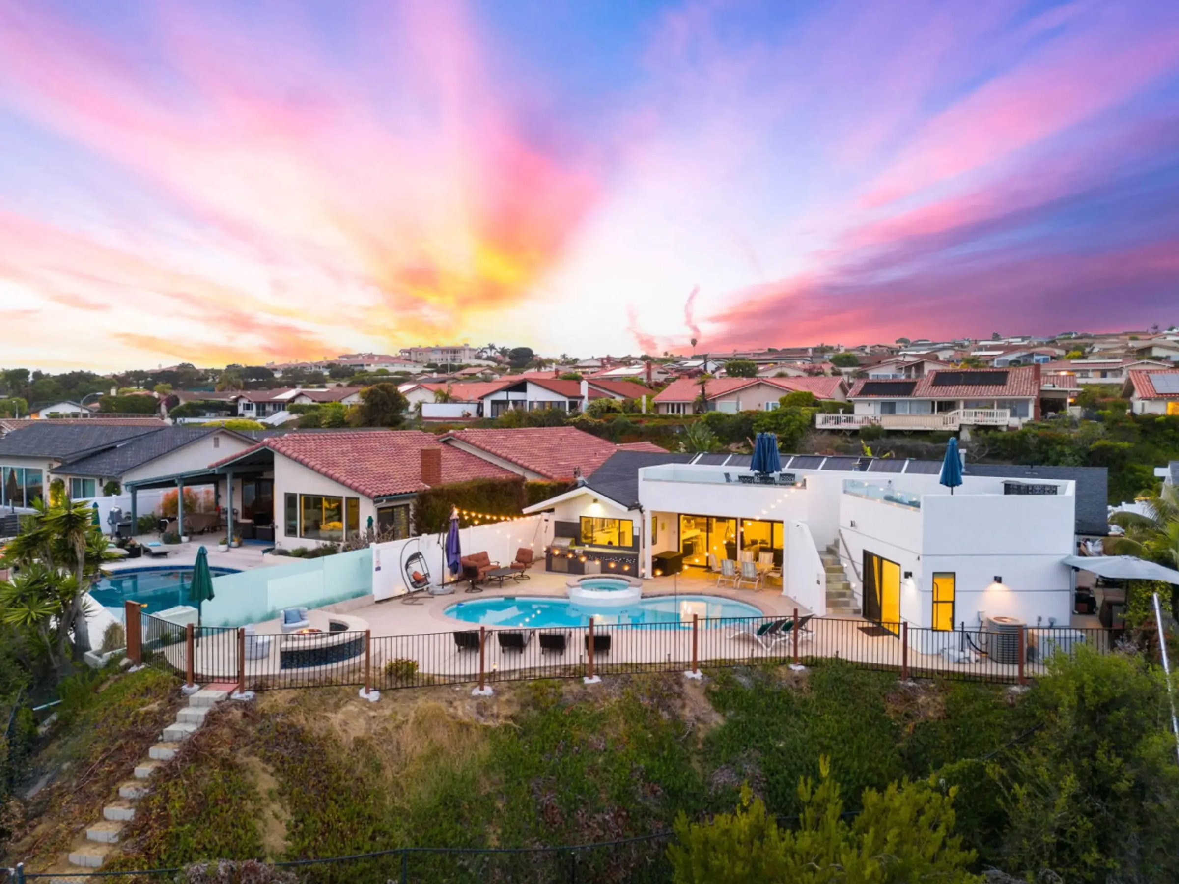 Luxury San Diego vacation rental with resort-style pool and entertaining patio, managed by West Coast Homestays