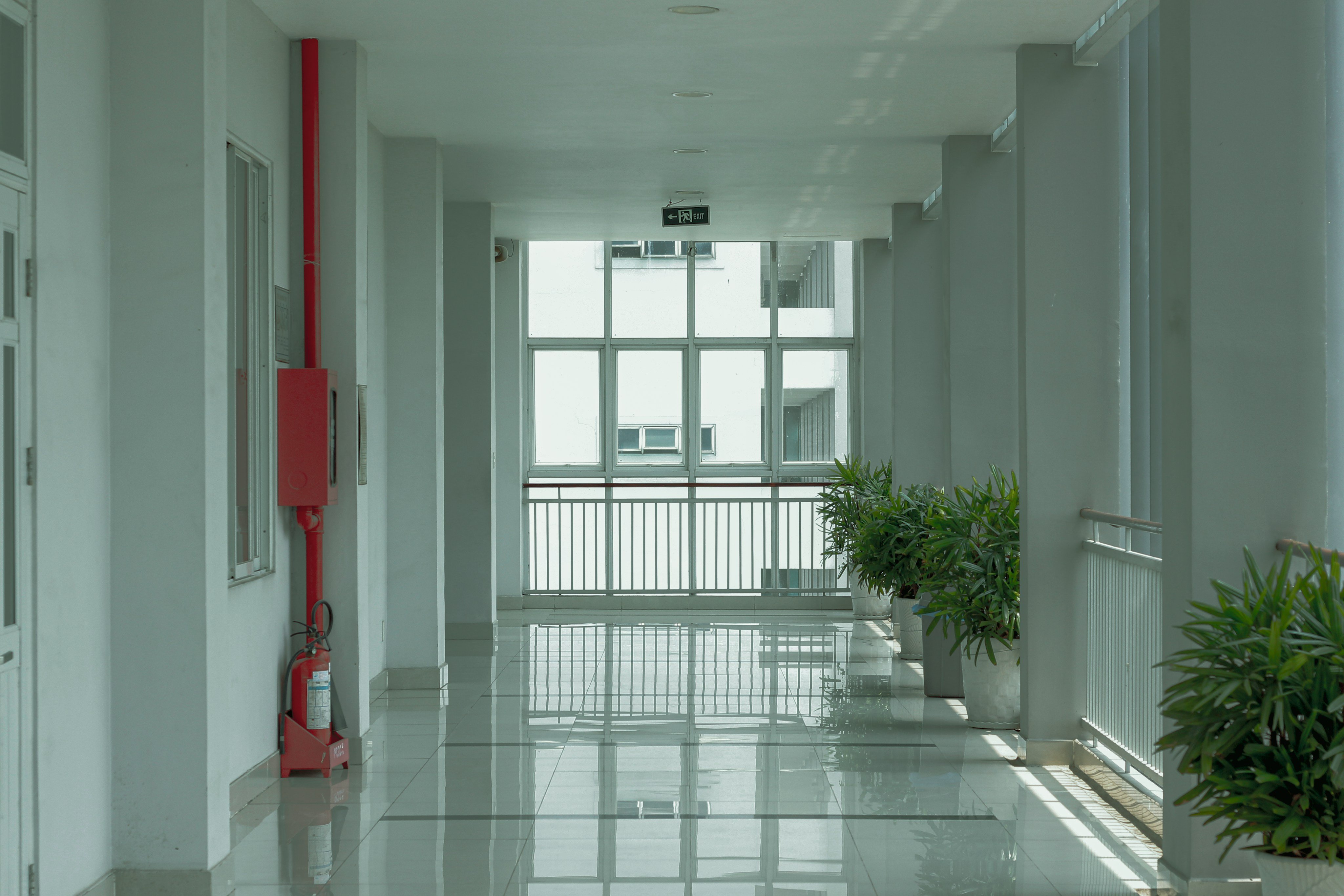 Bright hallway with a fire extinguisher on the wall