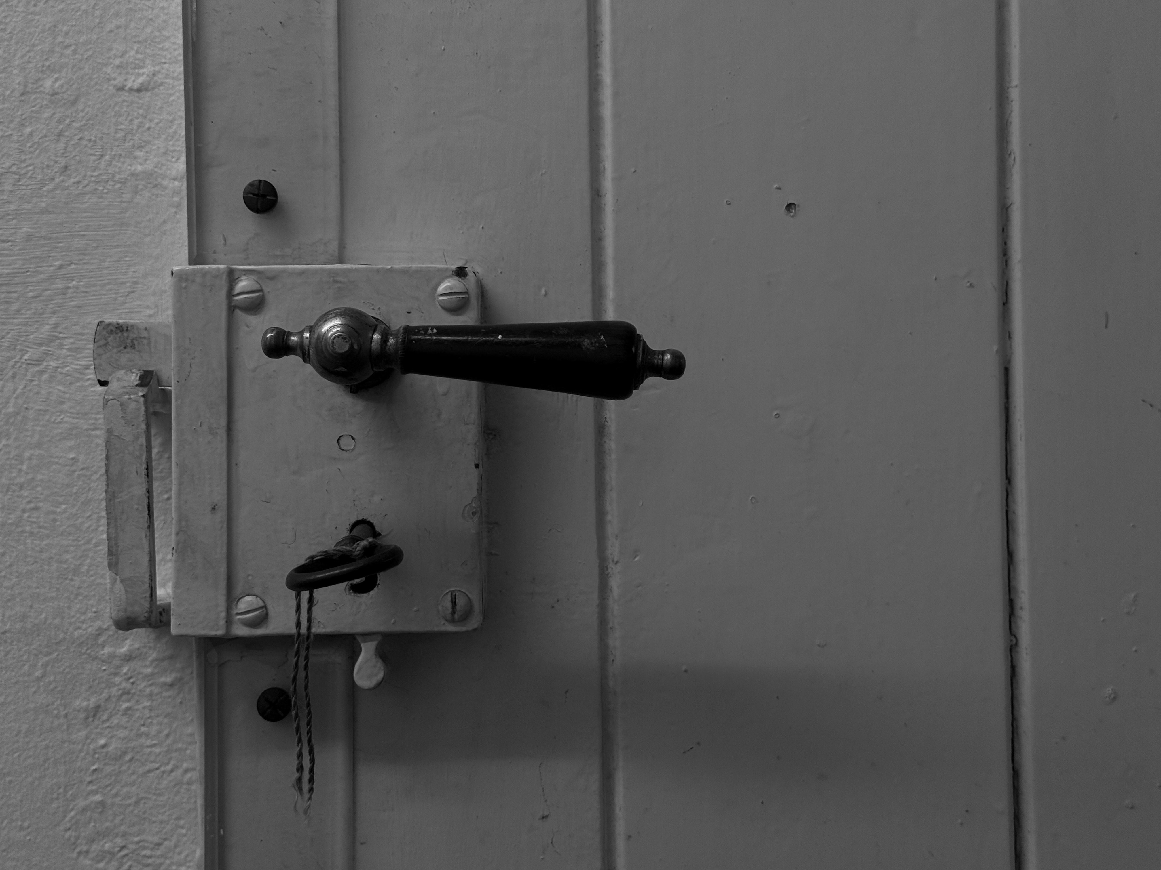 Old door handle and lock with a key