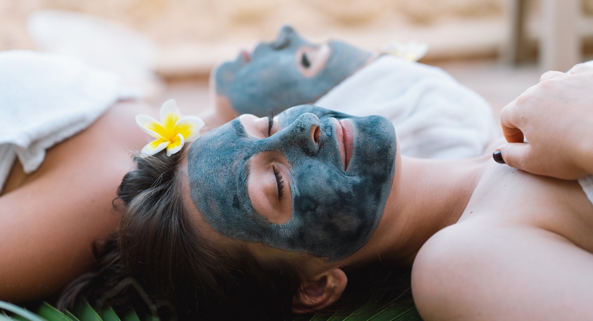 A couple getting facial care at a spa in Maui