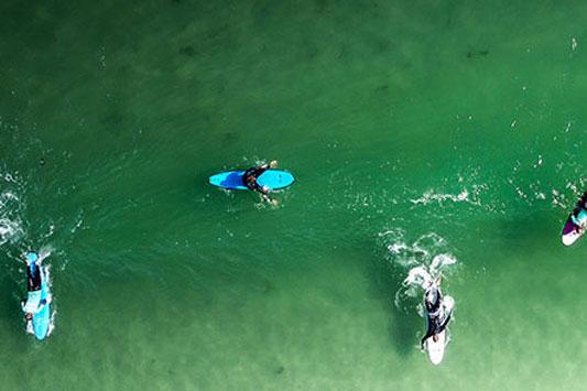Surfers in Maui Paradise