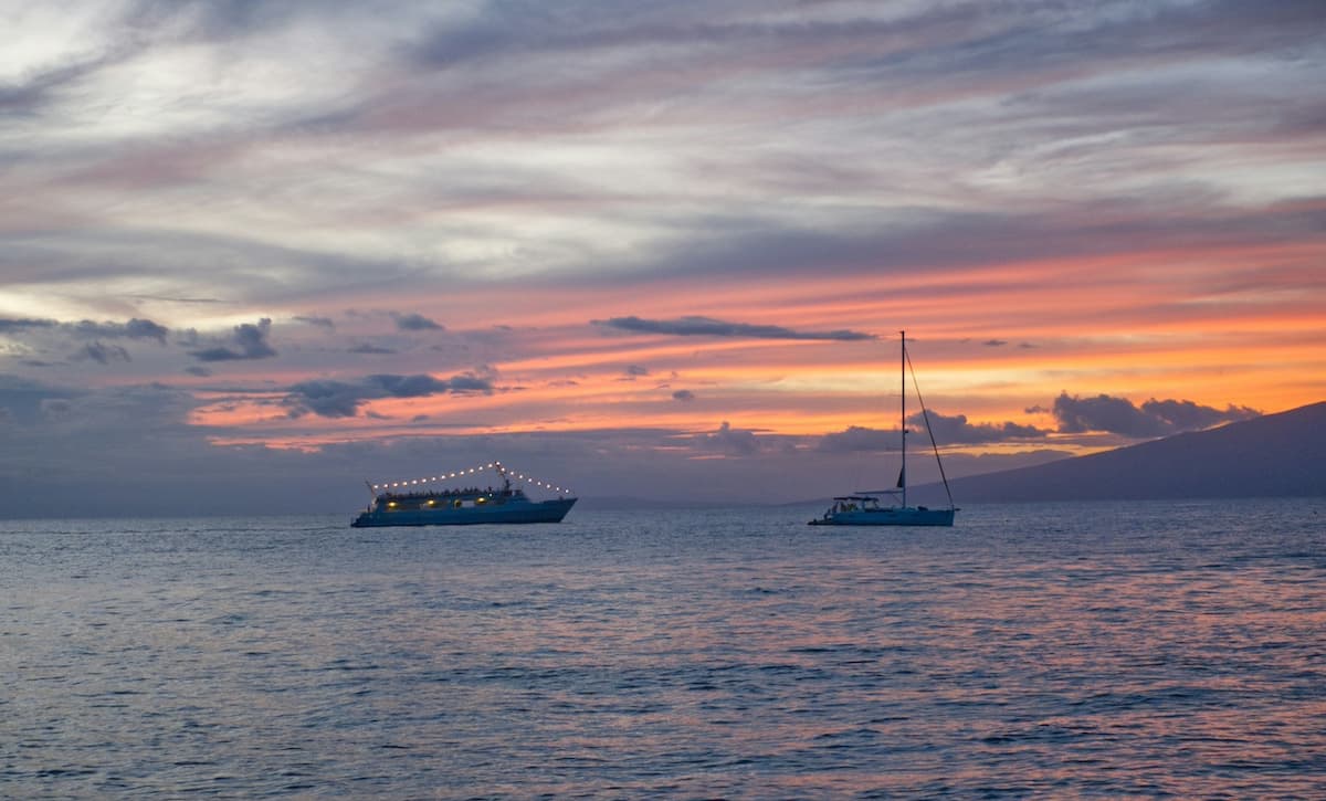 Going on a romantic sunset dinner cruise is a must-do on your Maui honeymoon itinerary