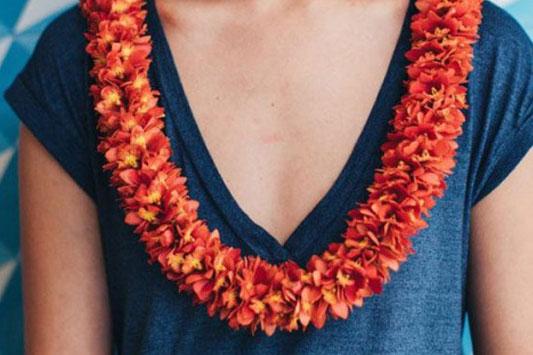 guest wearing garland