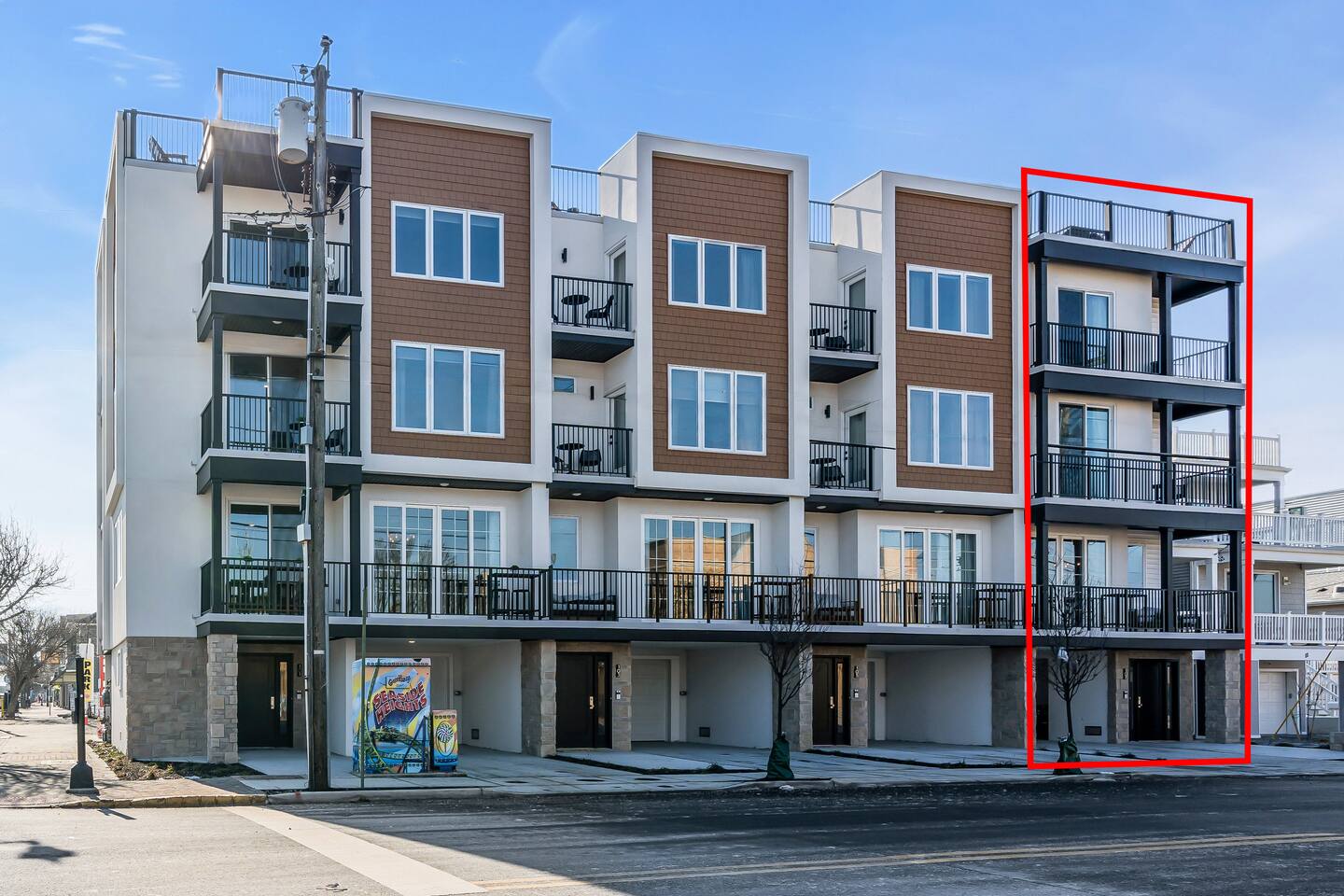 Corner-lot new construction condo building at 101–107 Grant Ave, Seaside Heights, NJ, featuring rooftop decks and ocean views, designed for short-term rental investment.