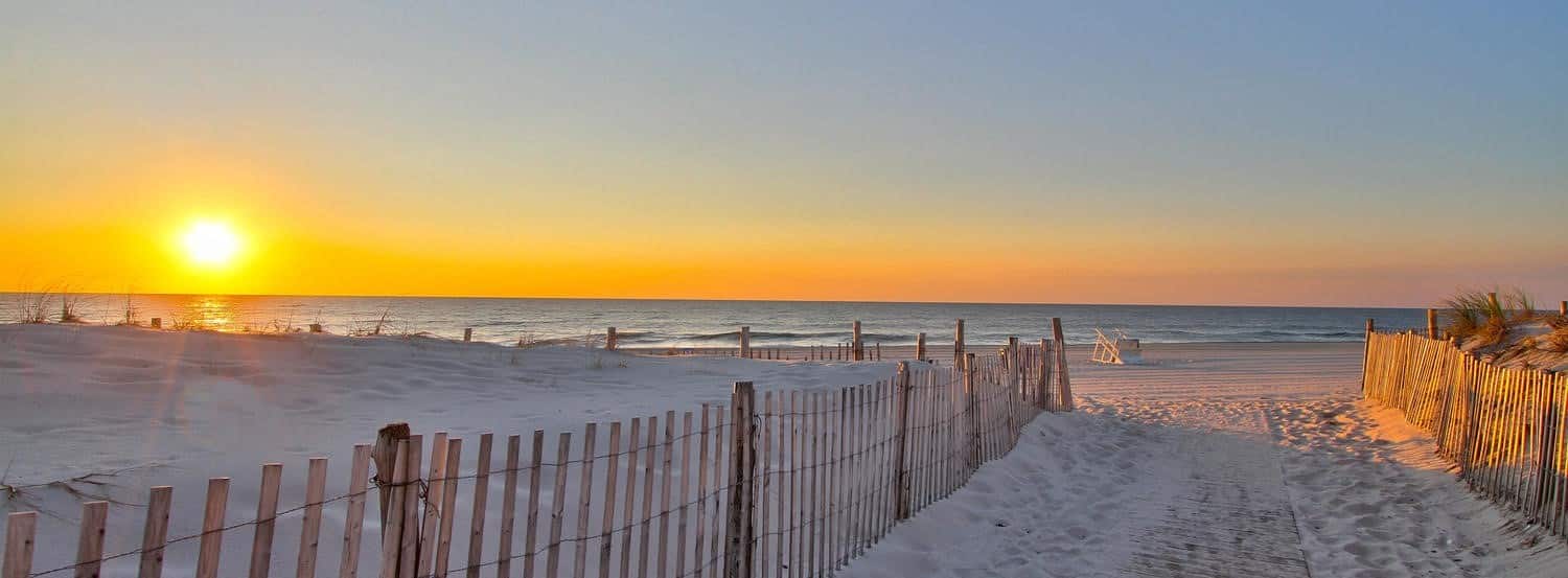 Sunrise over Seaside Park NJ beach and dunes, Breezy Beach Stays rental property.