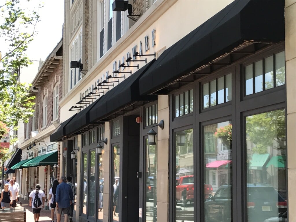 Charming storefronts along Arnold Avenue in Lavallette, showcasing boutique shops and a vibrant shopping atmosphere.