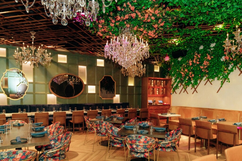 Luxurious interior of Gabriella’s Italian Steakhouse featuring floral decor, chandeliers, and elegant seating, emphasizing a fine dining experience at the Jersey Shore.