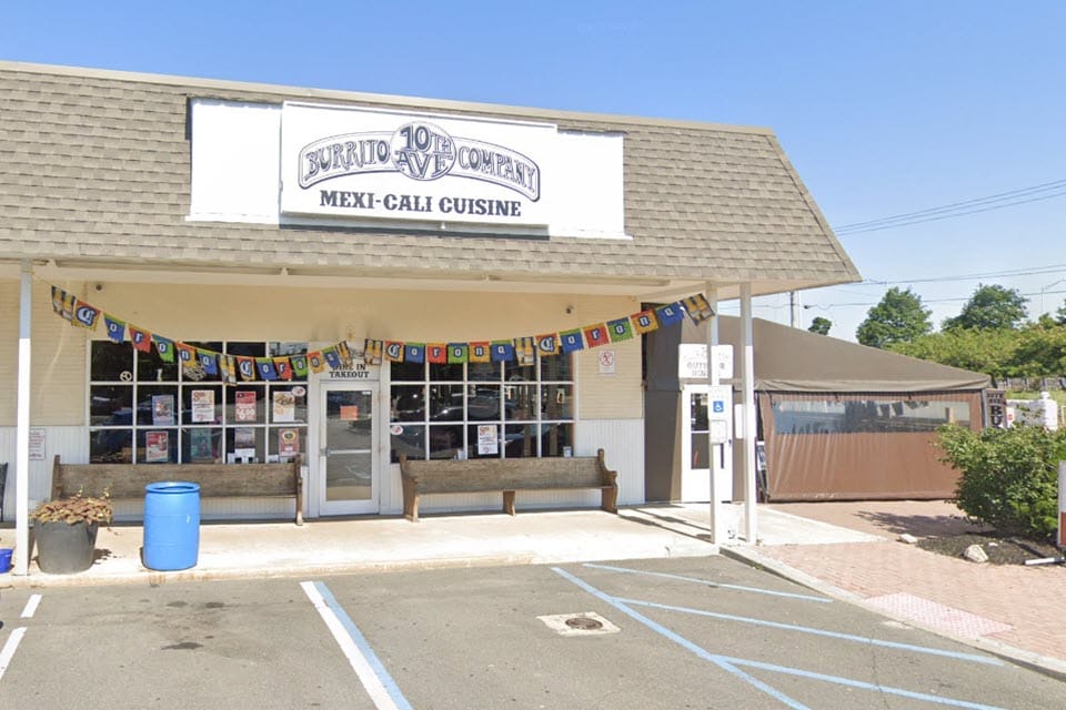 10th Avenue Burrito exterior view, featuring pet-friendly outdoor seating and a lively atmosphere, ideal for dining with dogs near the Jersey Shore.
