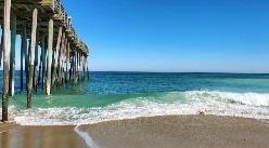 bottom of a pier at the shore line