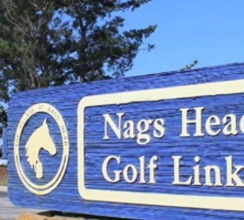 a sign with Nags Head Golf Links
