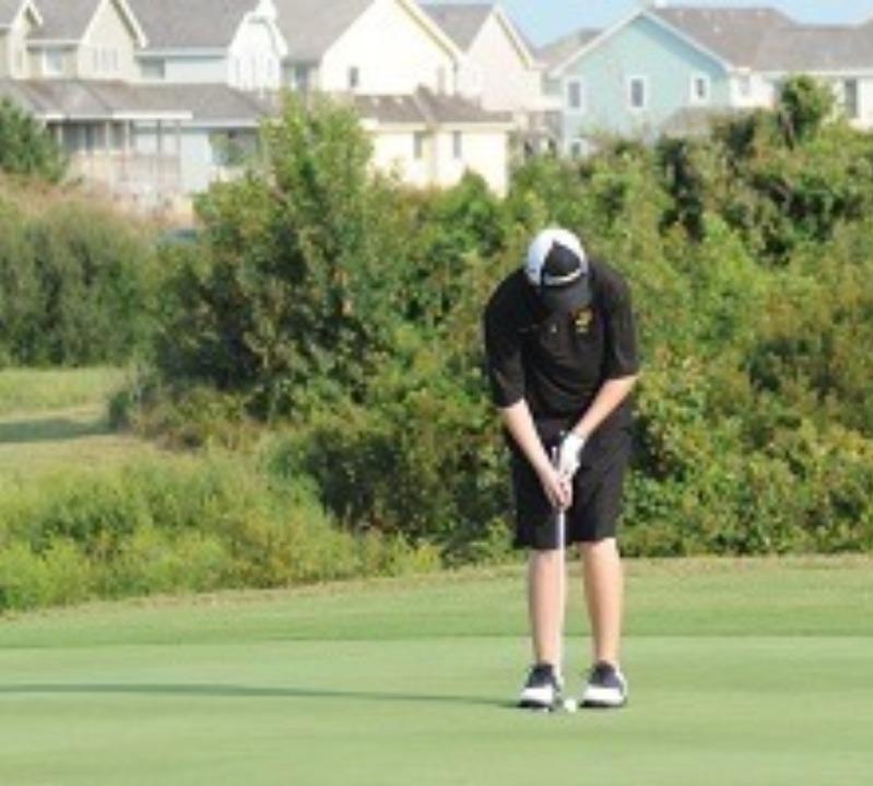 golfer readying for the drive