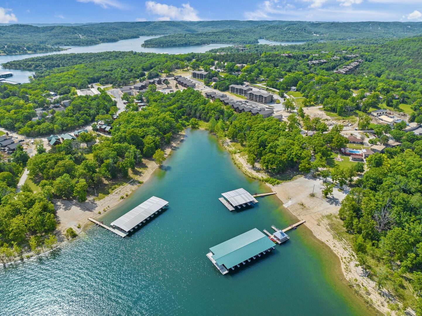 Covered boat docks on Table Rock Lake in the Ozark hills near Branson, Missouri