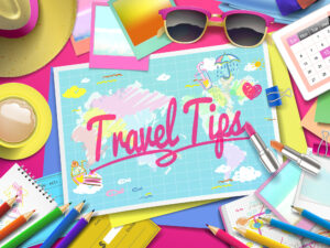 Travel Tips on map, top view of colorful travel essentials on table