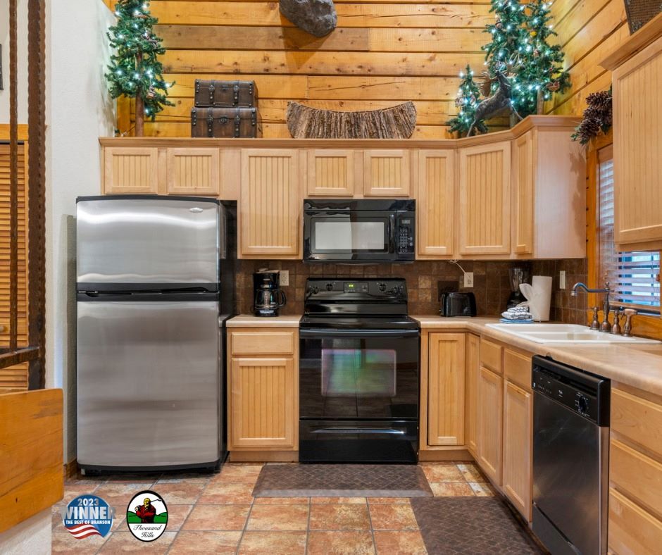 A contemporary kitchen with sleek stainless steel appliances and warm wood cabinets, creating an inviting culinary space.