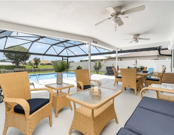 Ocean Reflections beach-themed Cape Coral vacation home with heated pool and boat dock